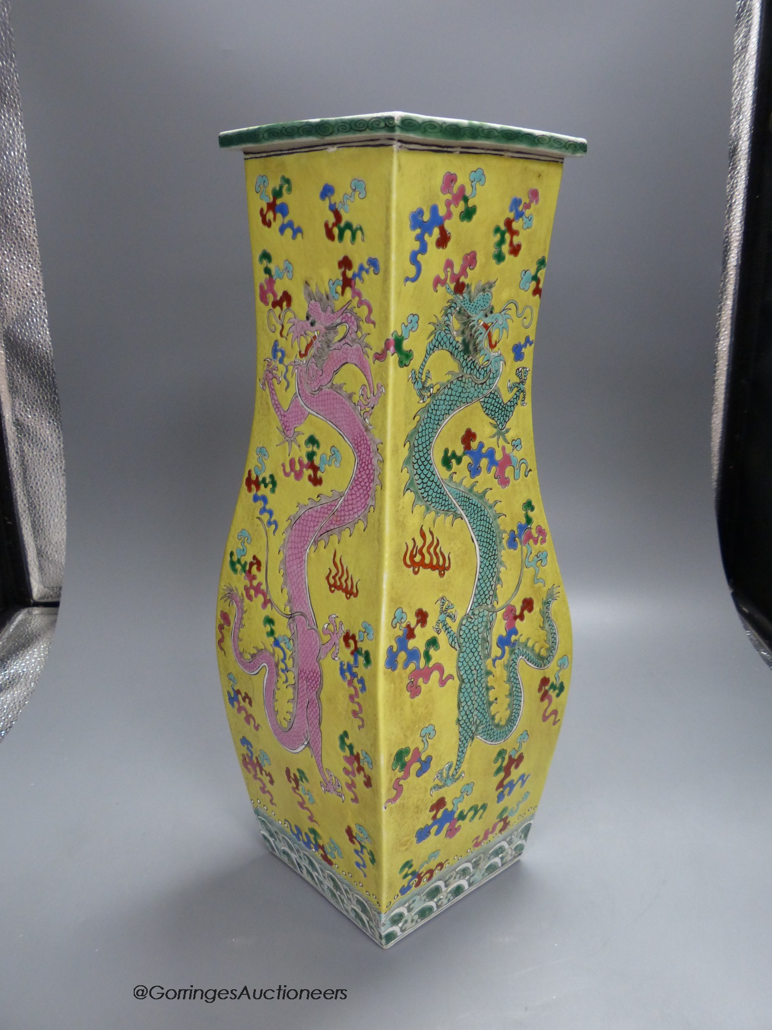 A Chinese yellow ground 'dragon' square baluster vase, 43.5cm high